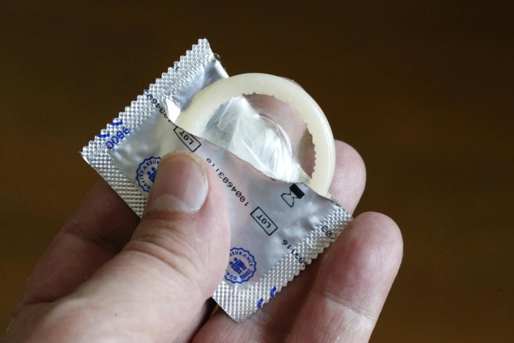 использование презерватива